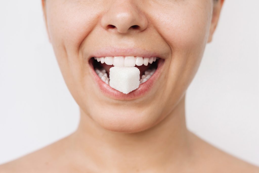 How Sugar Causes Tooth Decay and Damages Teeth