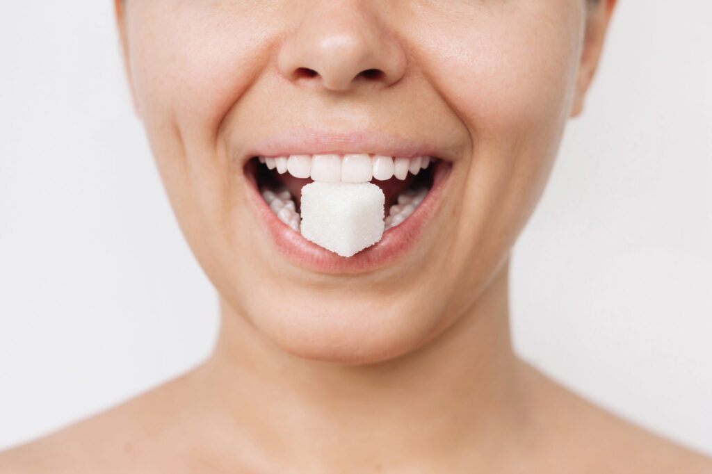 How Sugar Causes Tooth Decay and Damages Teeth